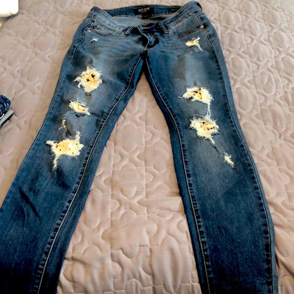Judy Blue Distressed jeans with crochet detail.